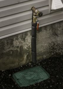 outdoor-underground-sprinkler-system-irrigation-valve-box-and-main-line-naiad-calgary-alberta-1-scaled-1-213x300.jpg
