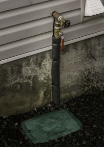 Outdoor underground sprinkler system irrigation valve box and main line naiad calgary alberta 1 scaled 1 213x300